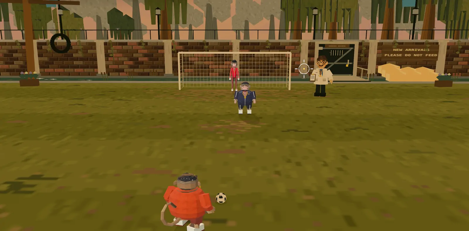 The empty monkey enclosure at dusk: one keeper, one goal, a brick wall.